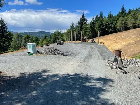 Finished gravel driveway leading up to the shop site